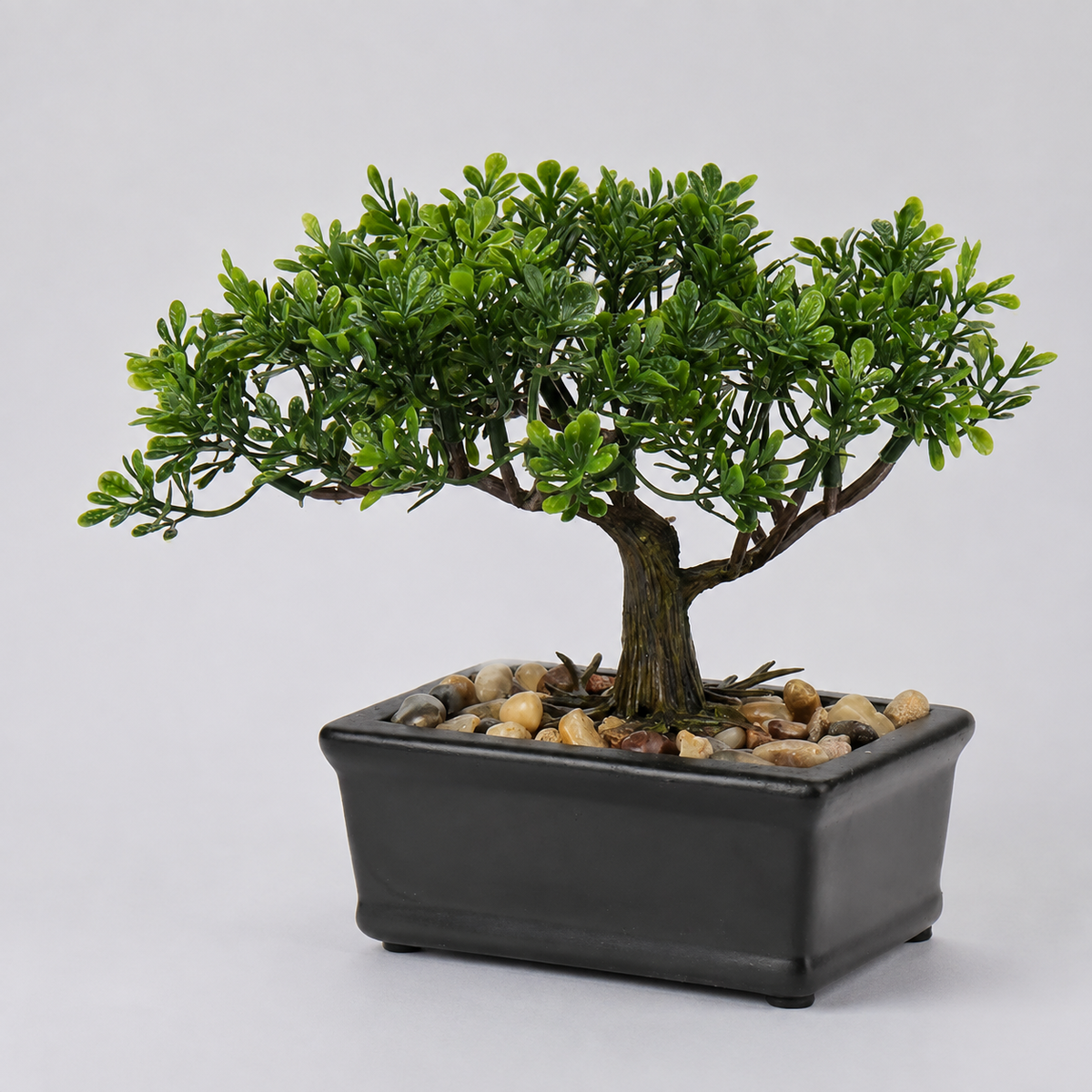 Mini Faux Bonsai Tree in Black Ceramic Pot, Green Tabletop Plant with Pebble Detail — styled product view 10