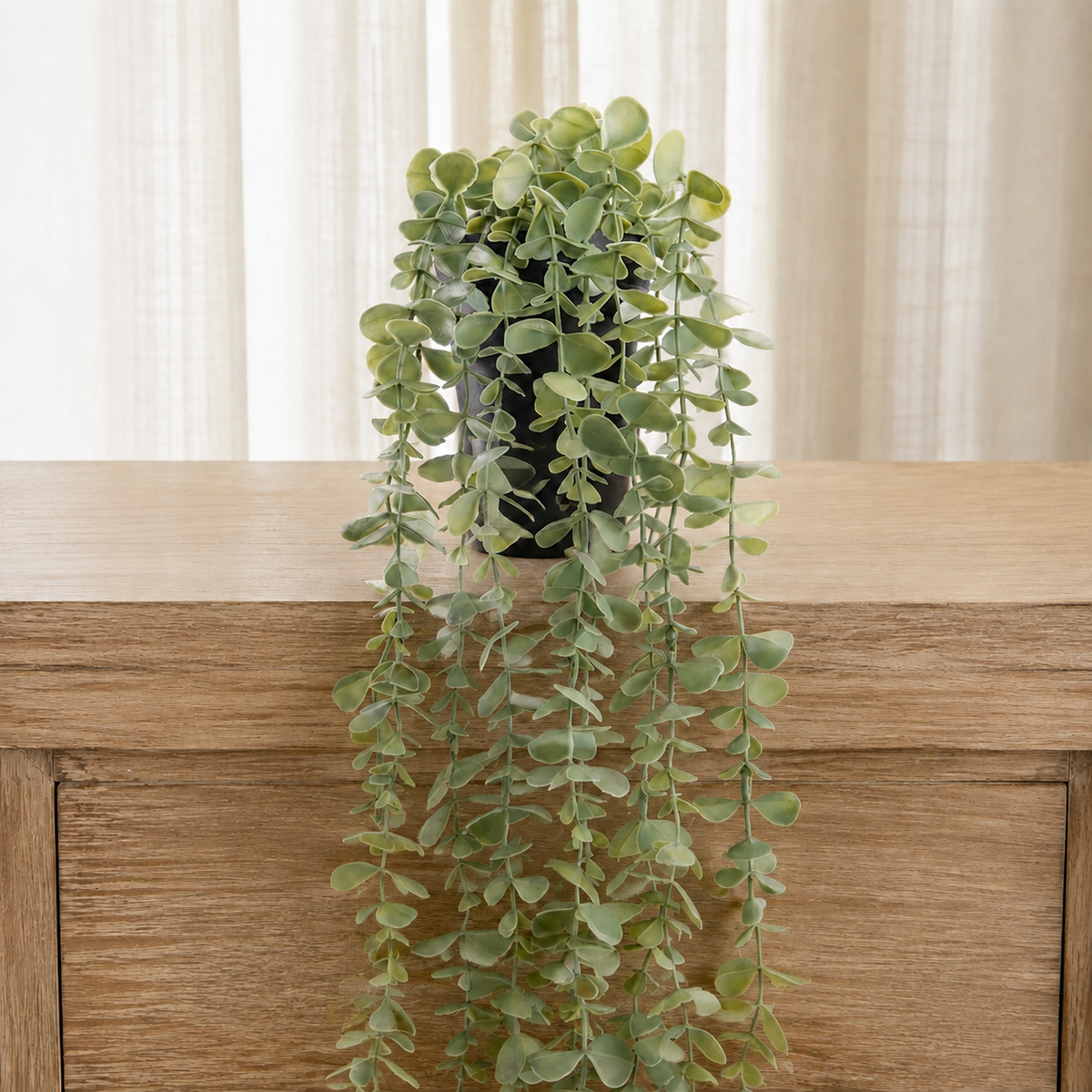 Faux Hanging Eucalyptus Plant in Black Pot, 24 Inch Gray Green Trailing Shelf Decor — styled view 4