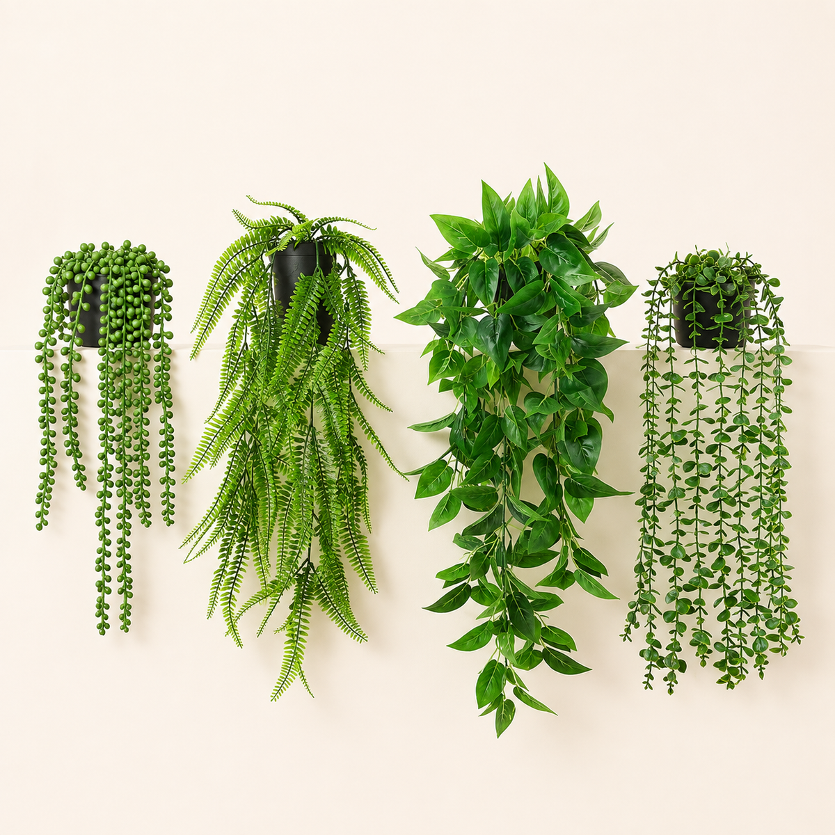 Set of 4 Trailing Faux Plants in Black Pots, Eucalyptus Fern Pothos and String of Pearls — styled view 1