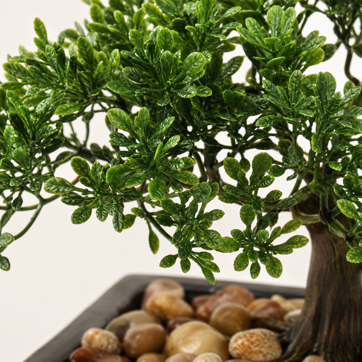 Mini Faux Bonsai Tree in Black Ceramic Pot, Green Tabletop Plant with Pebble Detail — styled product view 3