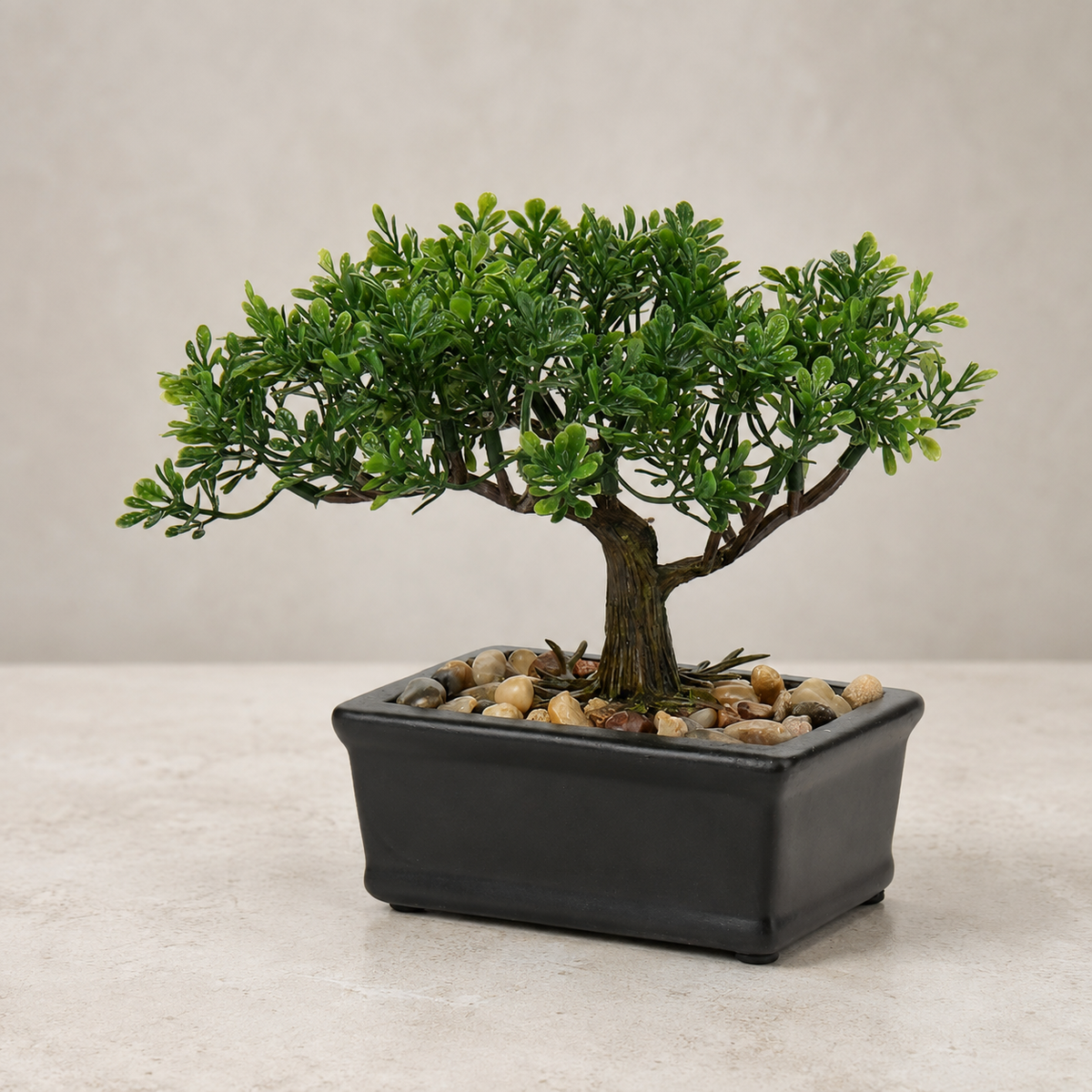 Mini Faux Bonsai Tree in Black Ceramic Pot, Green Tabletop Plant with Pebble Detail — styled product view 4