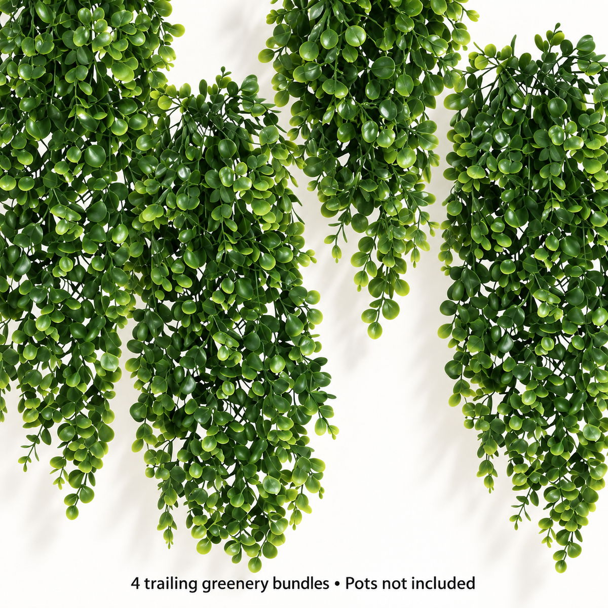 Four trailing artificial greenery bundles with small oval leaves — lower detail