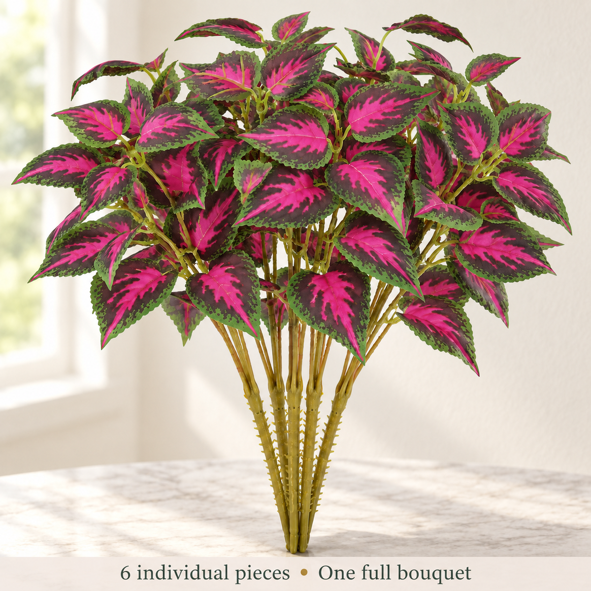 Artificial red-green coleus stems — window light