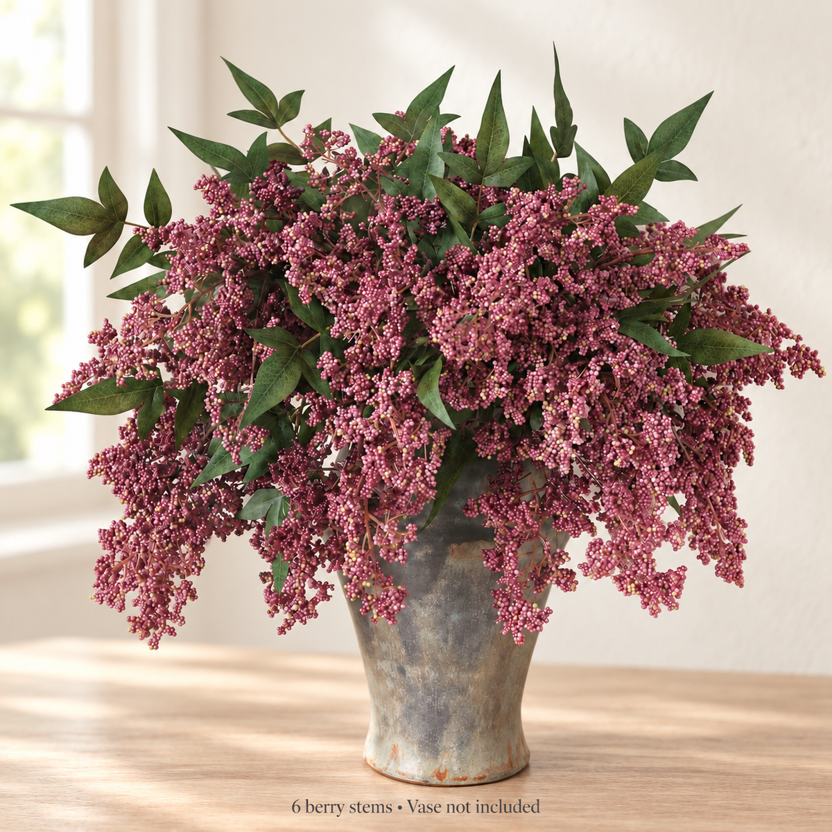Six dusty-plum nandina berry stems — window light