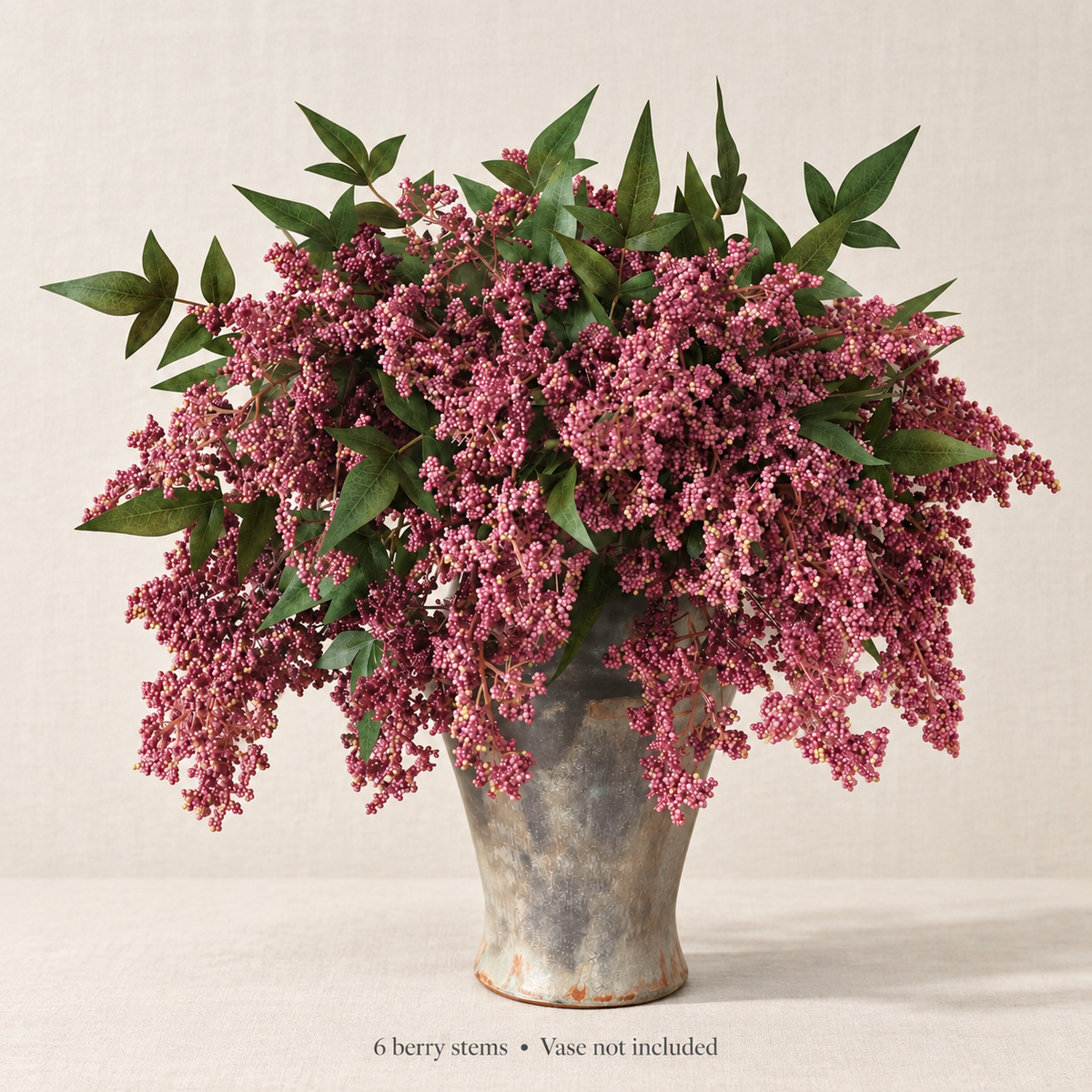 Six dusty-plum nandina berry stems — airy portrait