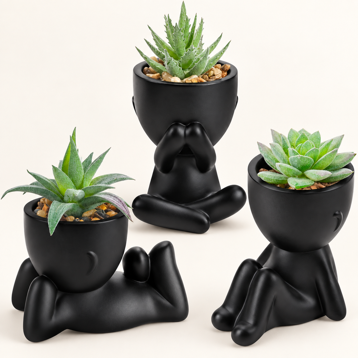 Three faux succulents in black person-shaped pots - product detail and inclusion view 06