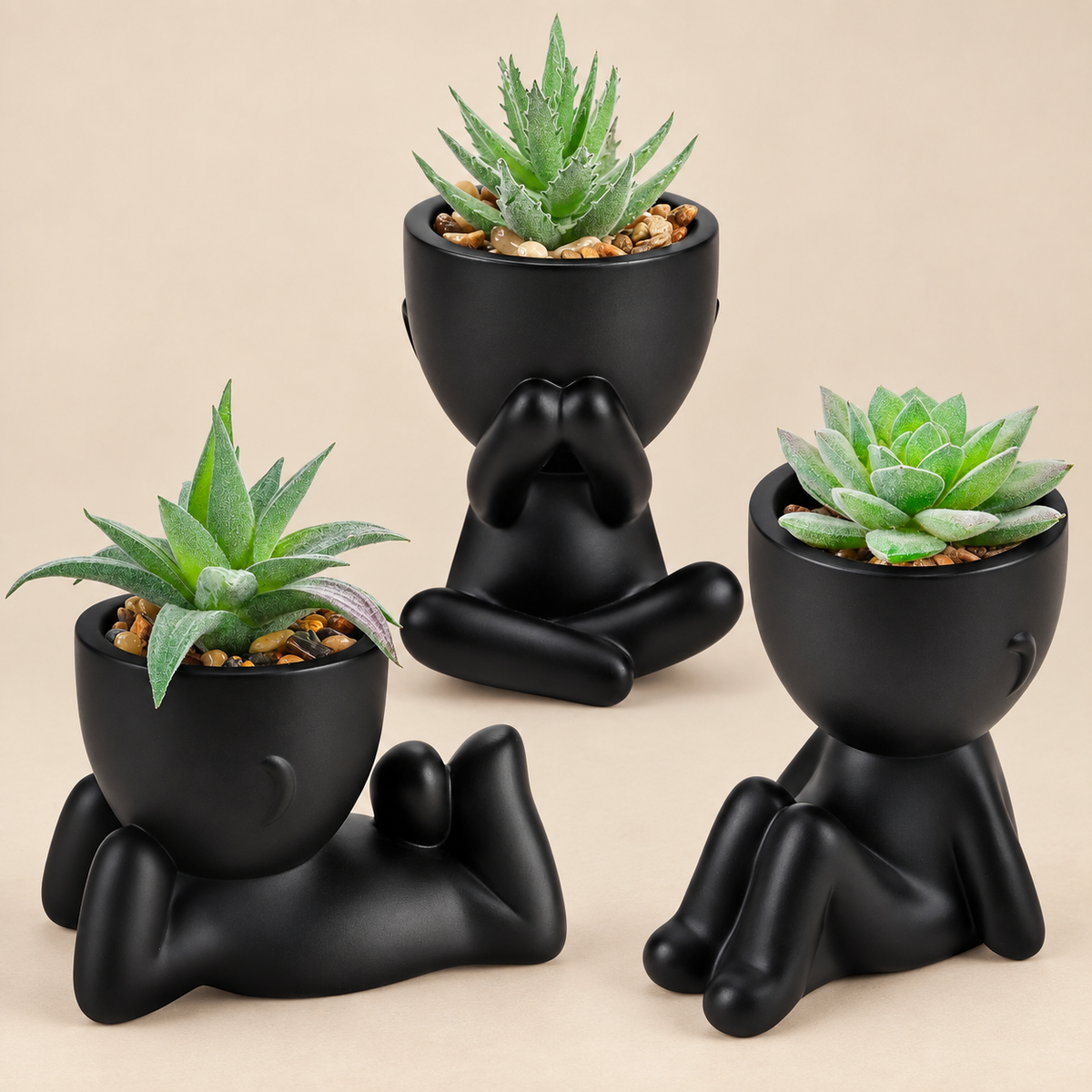 Three faux succulents in black person-shaped pots - product detail and inclusion view 07