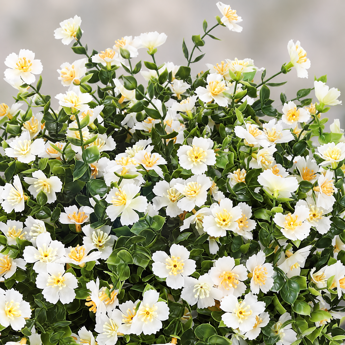 12 white artificial flower bundles with yellow centers, no planters - main product view