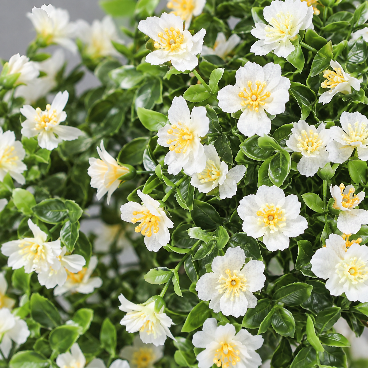 12 white artificial flower bundles with yellow centers, no planters - product detail and inclusion view 08